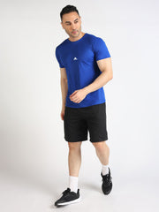 URBAN WOLFS model wearing men's blue dry-fit mesh t-shirt with athletic fit paired with black shorts