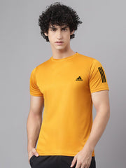 Wear Up men's dry fit premium t shirt in mustard yellow worn by male model with small chest logo and sleeve stripes