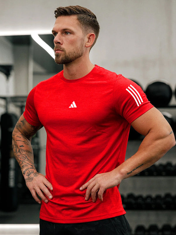 URBAN WOLFS men's red dry-fit t-shirt on muscular model athletic fit moisture wicking gym top