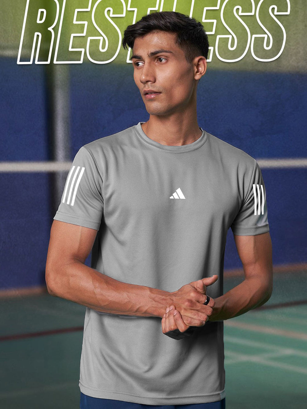 URBAN WOLFS men's grey dry-fit gym tee on male model in indoor court with white sleeve stripes