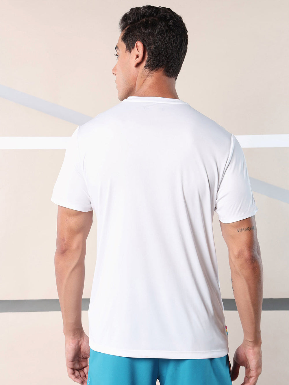 URBAN WOLFS men's white mesh dry-fit tee back view on male model athletic short sleeve